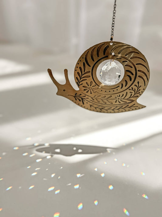 Surya Snail Engraved Brass Suncatcher