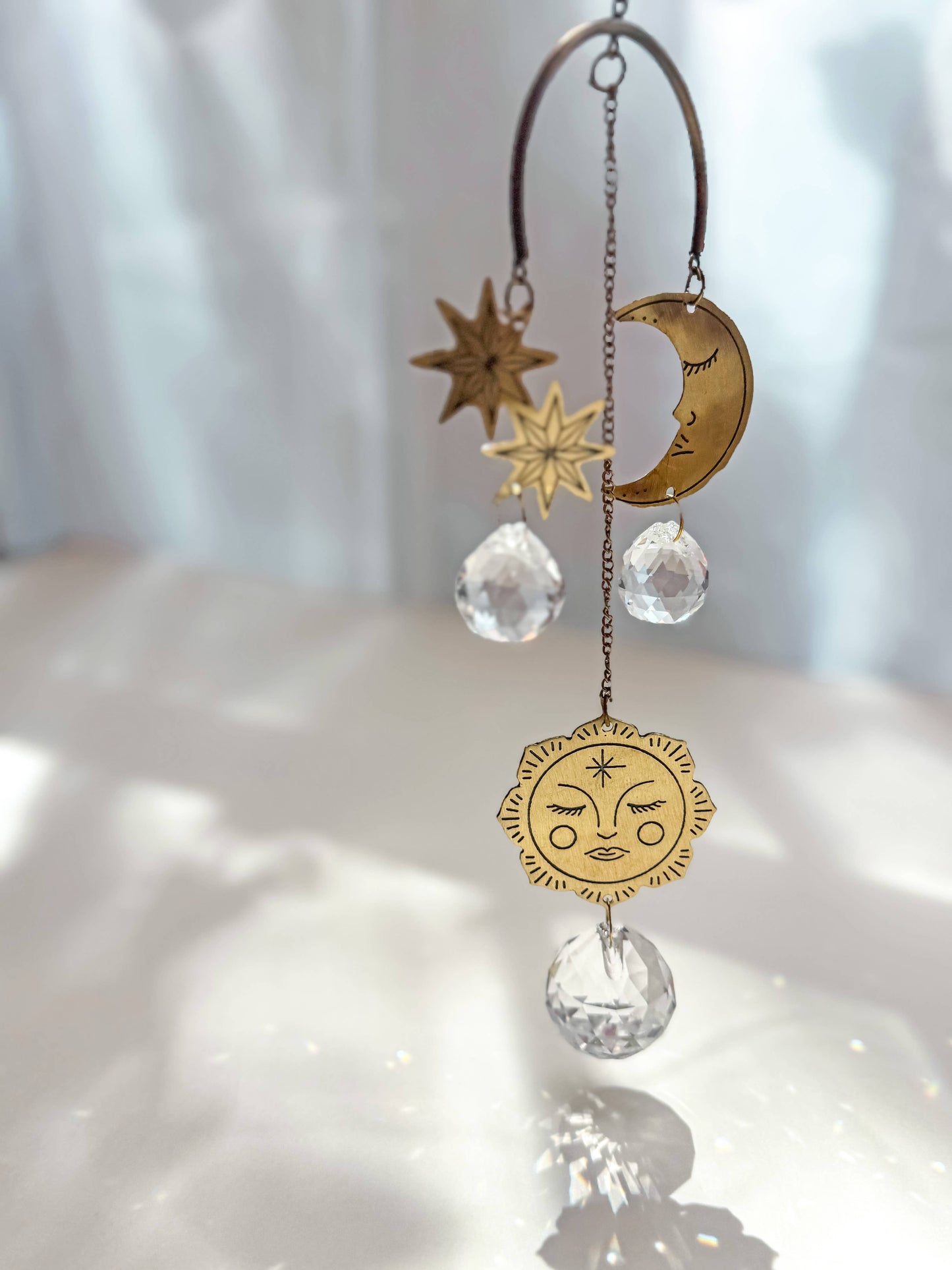 Surya Celestial Moon and Sun Engraved Brass Suncatcher Mobile